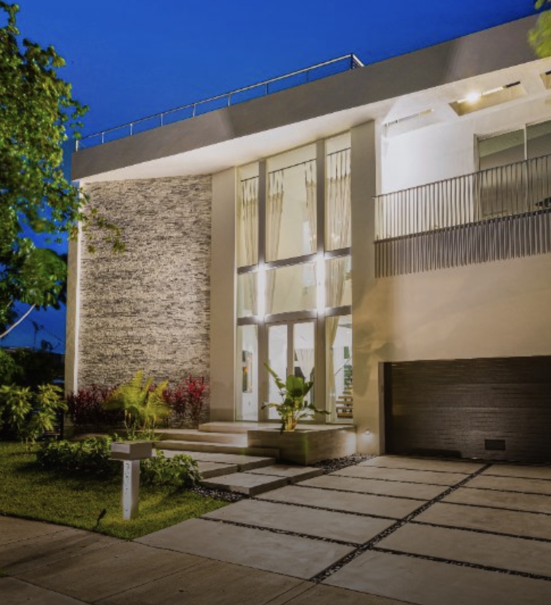 Contemporary home exterior at dusk